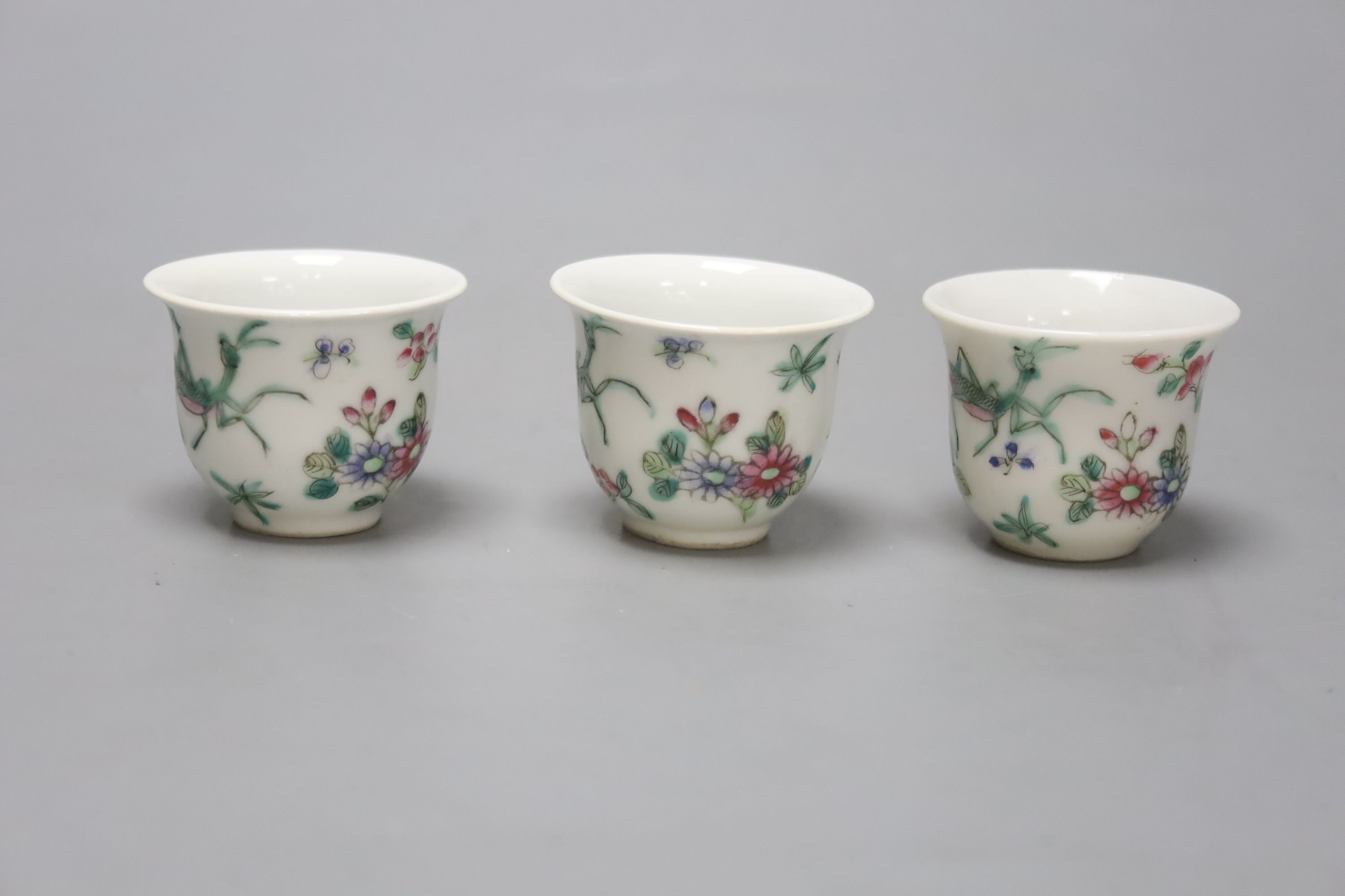 A Chinese Famille Rose miniature tea set with tray, length 18cm